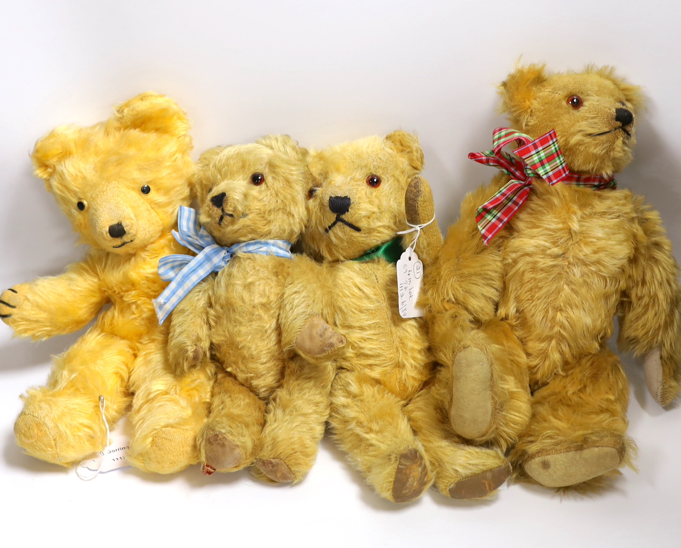 An Irish bear, 28cm, a 1950's Chiltern bear, 32cm, a German bear, 35cm and a Wendy Boston bear (4)